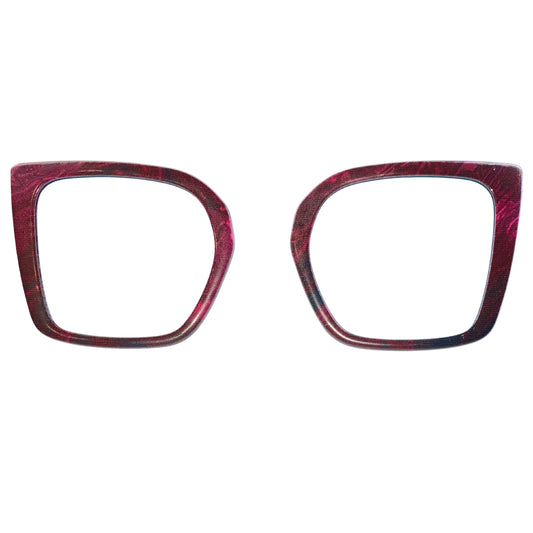 Two red and black eyeglass frames on a white background