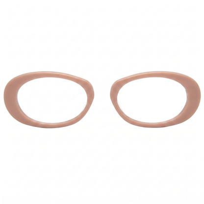 Two beige rubber gaskets on a white background